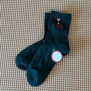 RAE DUNN green “cheers” socks. NWT. Size small